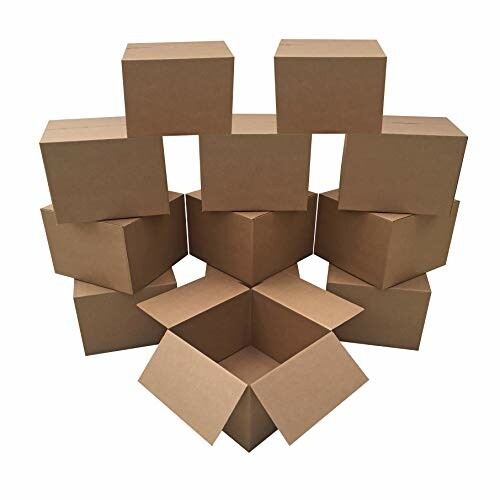 Stack of brown cardboard boxes with one open box in front.